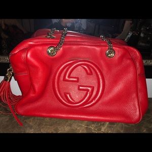 Red Gucci purse.